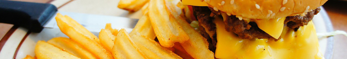 Eating Burger at Jake's Over the Top restaurant in Ogden, UT.